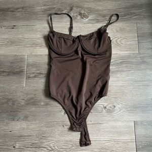 Brown bodysuit